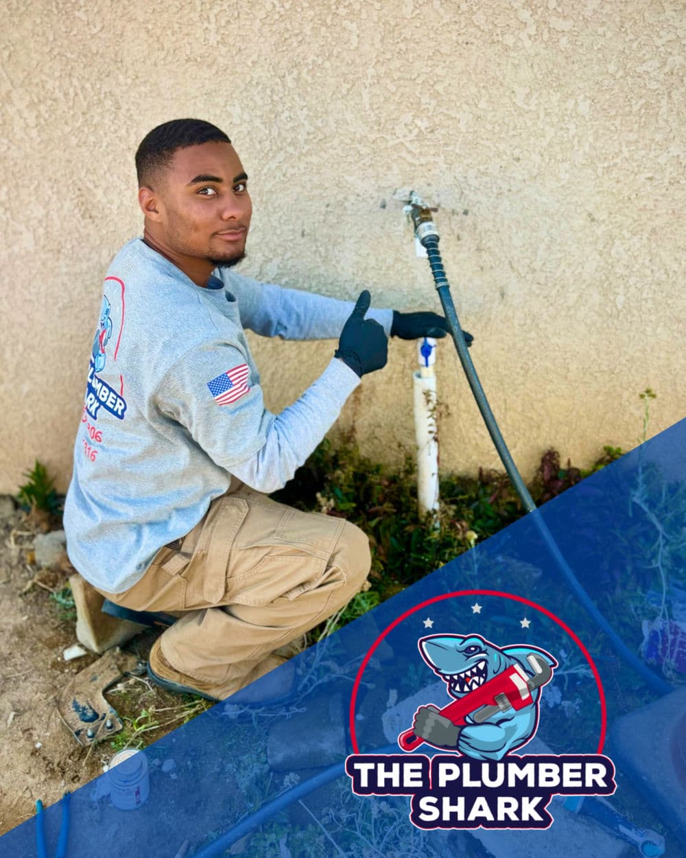 Plumber Shark technician thumbs up by a water connection outside a home.